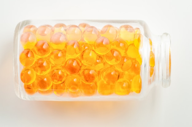 Yellow pills tablet on white 