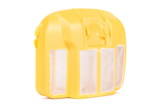 Yellow plastic air filter with white mesh for chainsaw