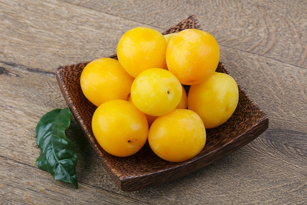 Yellow plums in the bowl