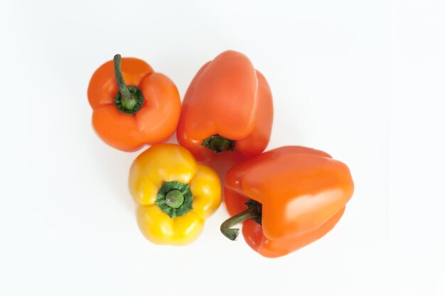 Yellow and red bell pepperisolated on a white background