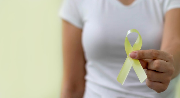 Yellow ribbon Yellow July Bone Cancer Awareness Month and Viral Hepatitis