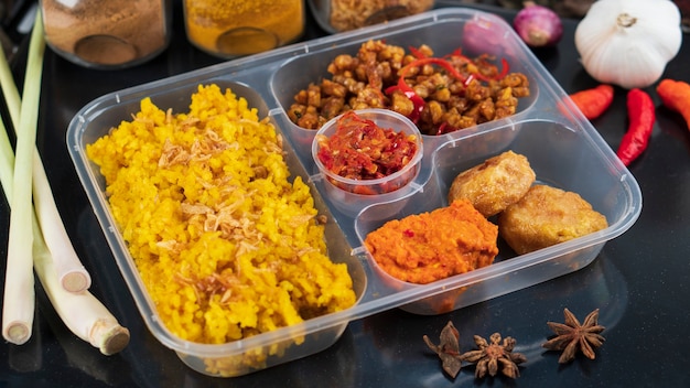 Yellow Rice or Nasi Kuning is a traditional Indonesian food for commercial packaging