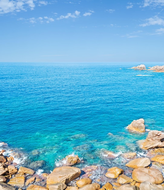 Yellow rocks in Costa Paradiso water