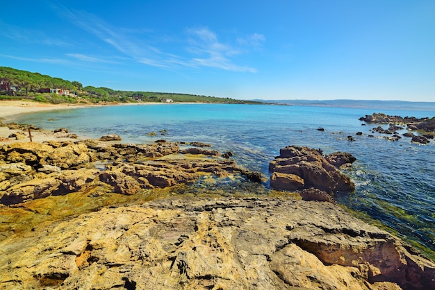 Yellow rocks in Le Bombarde beach Sardinia