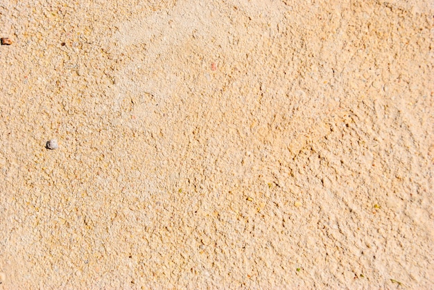 Yellow-sand concrete wall background