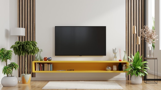 Yellow shelf and TV in modern living room have empty white wall background