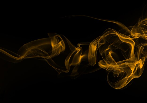 Yellow smoke abstract on black background, fire design