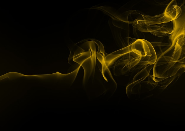 Yellow smoke abstract on black background, fire design