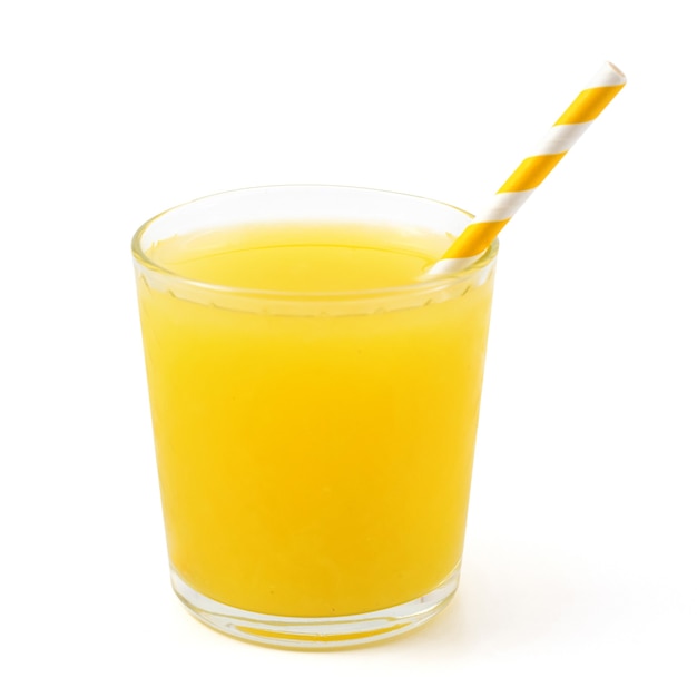 Yellow soft drink in glass. Isolated on white background.