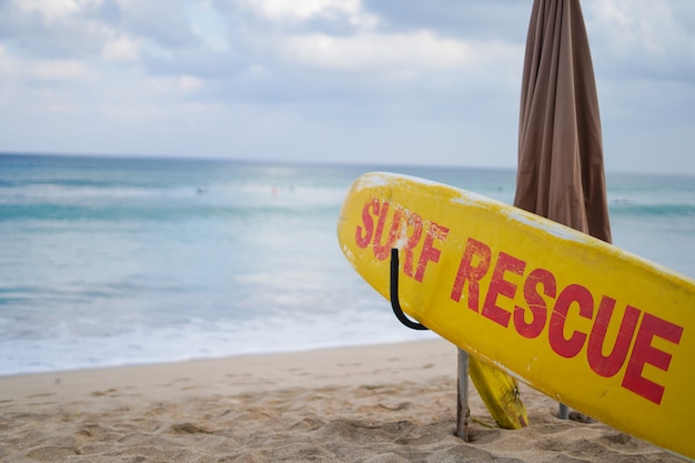 Yellow surf rescue board at the beach