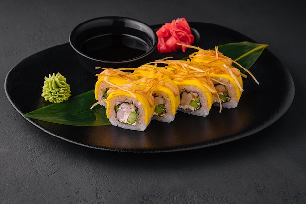 Yellow Sushi Rolls with shrimp and cucumbers