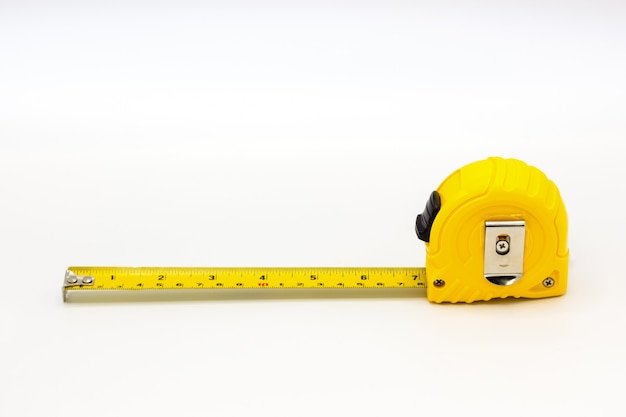 Yellow tape measure isolated on white background