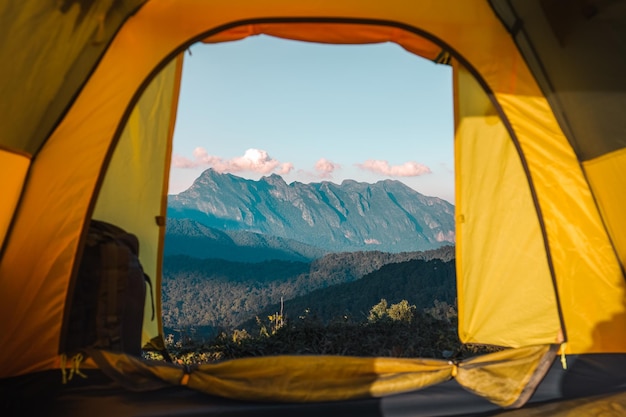 Yellow tent on the mountain and sunset view,Doi Luang