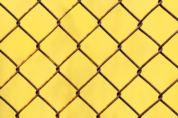 Yellow texture with rusty mesh