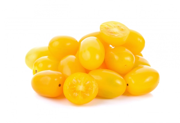 Yellow tomatoes on white background