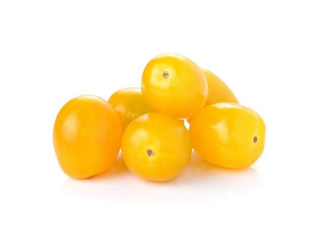 Yellow tomatoes on white background