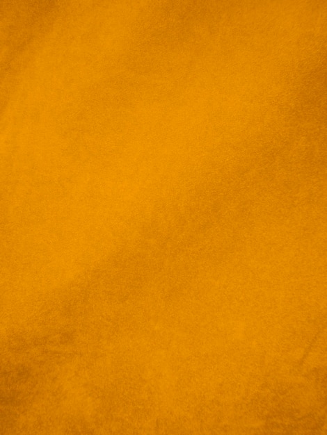 Yellow velvet fabric texture used as background Empty yellow fabric background of soft and smooth textile material There is space for text