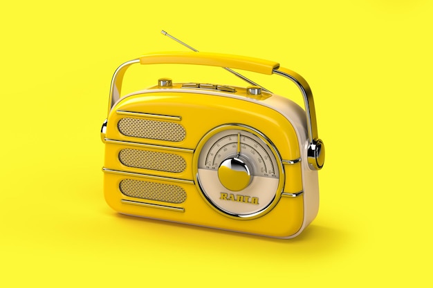 Yellow vintage radio on yellow background