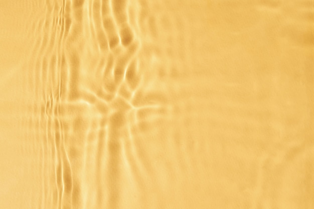 Yellow water texture background abstract pattern