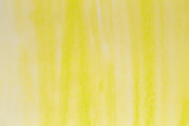 Yellow watercolor background hand painted by brush