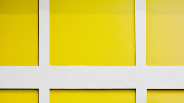 Yellow and white concrete wall background.