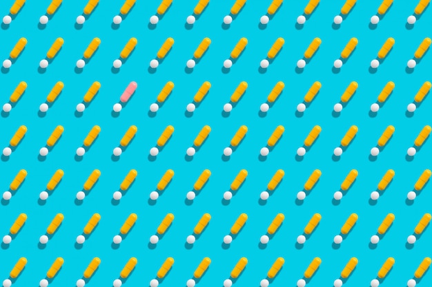 Yellow and white pills seamless pattern