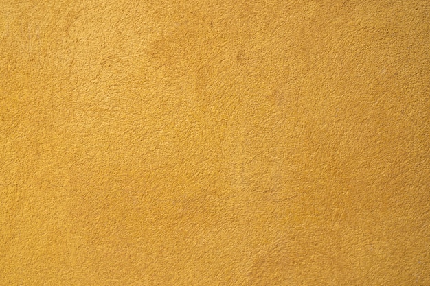 Yellowtextured concrete wall	 background