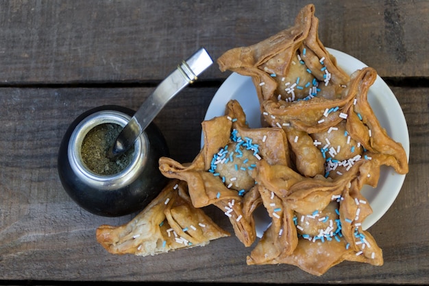 Yerba mate and fried pastries symbols of the Argentine tradition