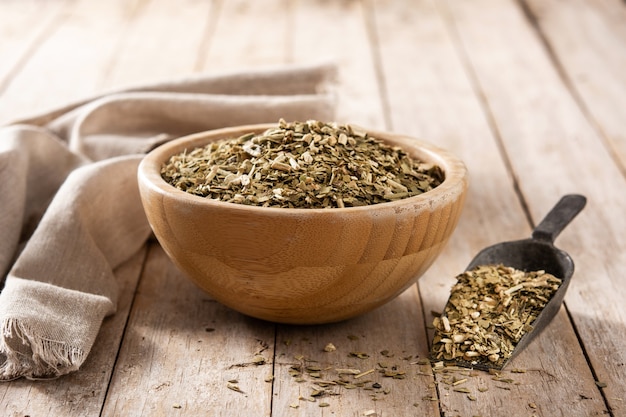 Yerba mate tea on wooden table. Traditional Argentinian beverage