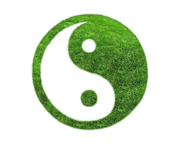 Yin yang symbol made from green grass isolated on white