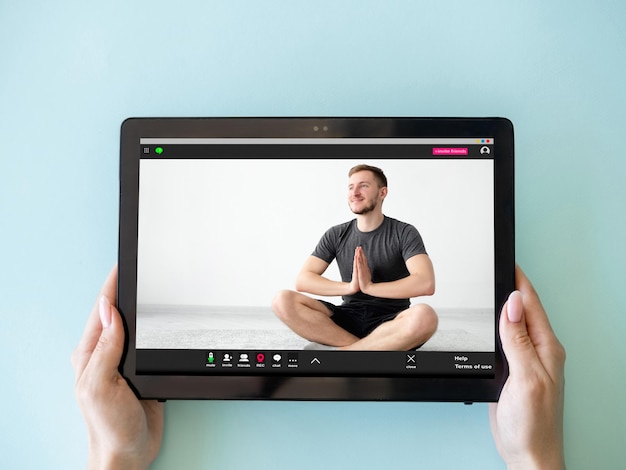 Yoga video class online meditation tablet man