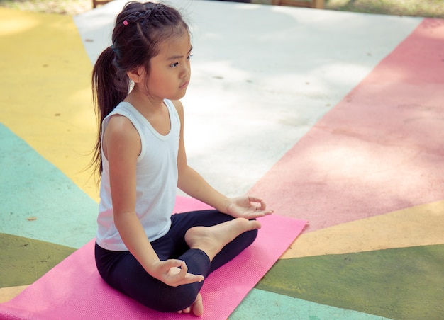 Yoga for young girl aged 6-7 Asian girl