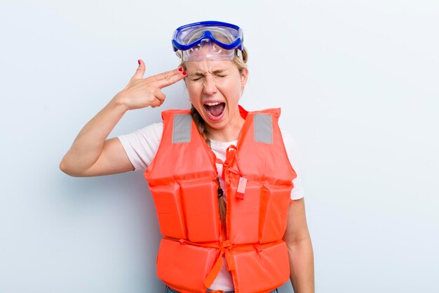 Young adult blonde woman life jacket concept