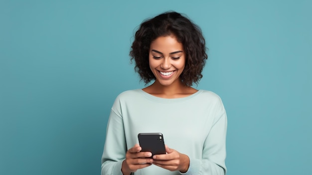 Young adult smiling happy pretty latin woman holding mobile phone looking at smartphone