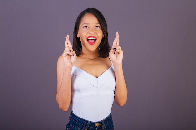 Young adult woman from northeastern brazil sign of luck luck fingers crossed wishing