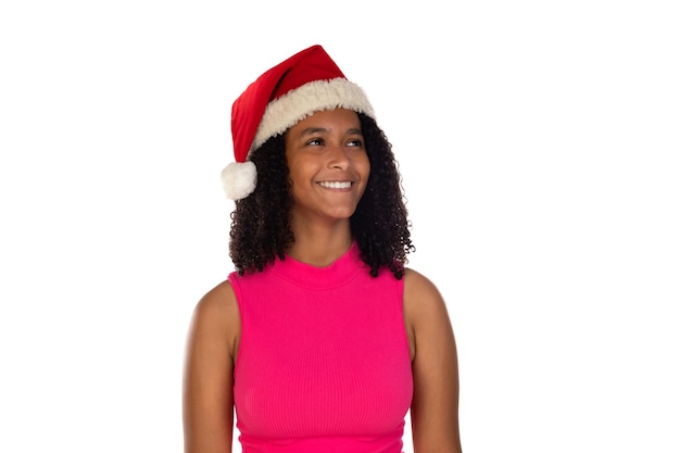 Young african american girl wearing christmas hat