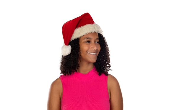 Young african american girl wearing christmas hat