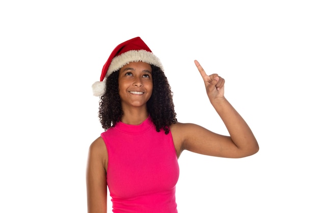 Young african american girl wearing christmas hat