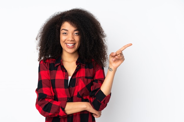 Young african american woman happy and pointing up