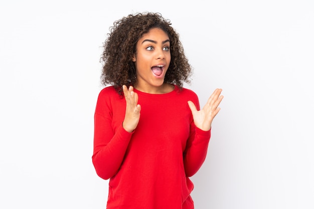 Young African American woman isolated with surprise facial expression