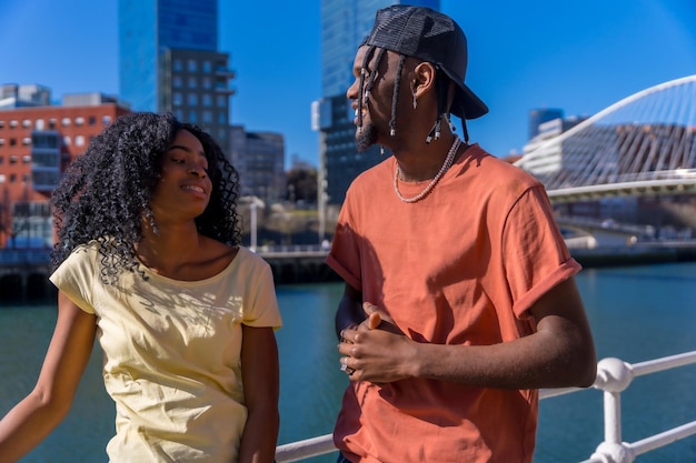 Young african american women in the city lifestyle friends concept vacation portrait smiling