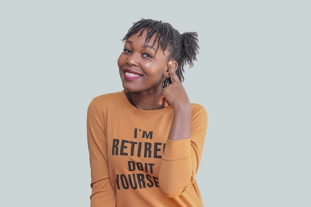 young african woman touching hair