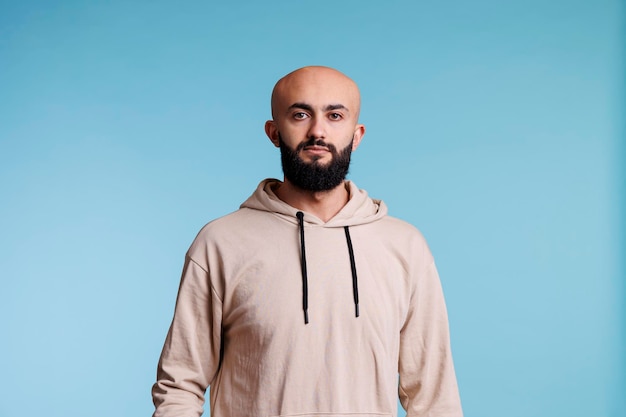 Young arab man standing in casual pose