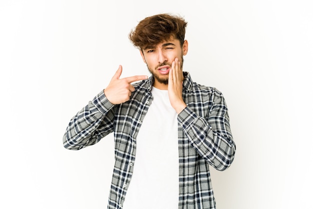 Young arab man on white,  having a strong teeth pain, molar ache.