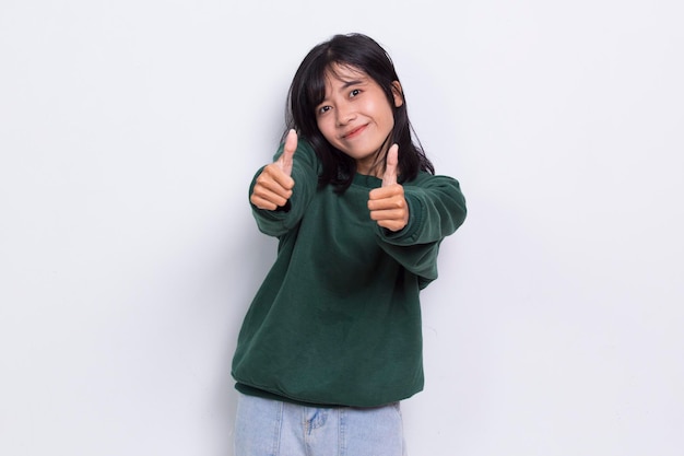 young asian beautiful woman with ok sign gesture tumb up isolated on white background