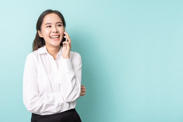 Young asian business woman using mobile phone