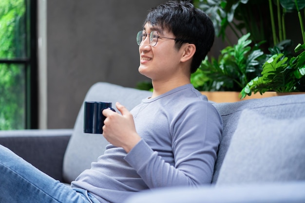 Young Asian businessman at home