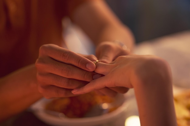 Young Asian couple eating dinner together