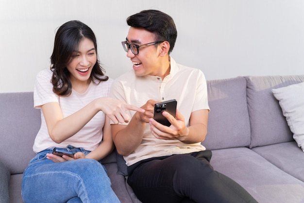 Young Asian couple at home