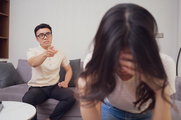 Young Asian couple at home